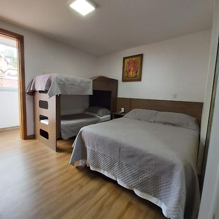 100% Flats Gramado Quarto foto